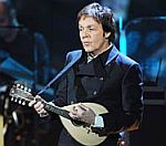 Sir Paul McCartney Praises Linda During BRITs Performance