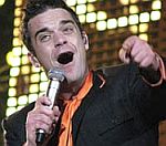 Robbie Williams' Life In Britain 'Was Like Alcatraz'