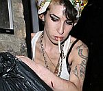Amy Winehouse Appears With 'Fresh Cut Outside Camden Home'