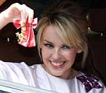 Kylie Minogue Picks Up OBE At Buckingham Palace