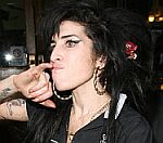 Amy Winehouse 'Broke Down' As Lindsay Lohan Was Jailed