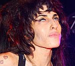 Amy Winehouse 'Put On Suicide Watch By Friends'