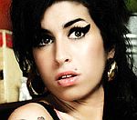 Amy Winehouse Gives Interview Via Door Telecom