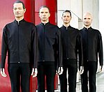 Kraftwerk Joined By British Olympic Cycling Team At 3D Manchester Gig