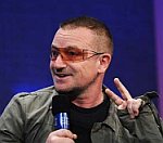 U2 'To Lose Millions Due To Bono's Back Injury'