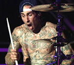 Blink-182's Travis Barker Settles 2008 Plane Crash Lawsuit