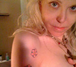 Semi-Naked Courtney Love Shows Off Tats On Twitter