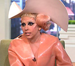Lady Gaga Wears Condom-Inspired Outfit To Promote AIDS Awareness